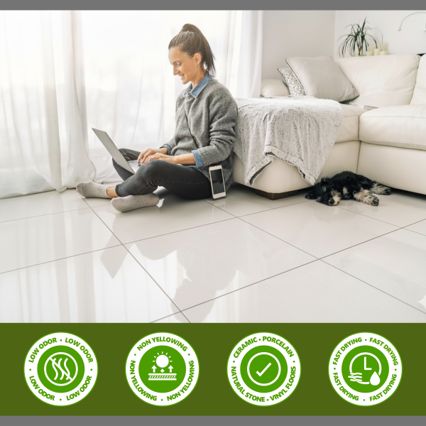 porcelain floor tile sealer Person working on laptop beside dog.